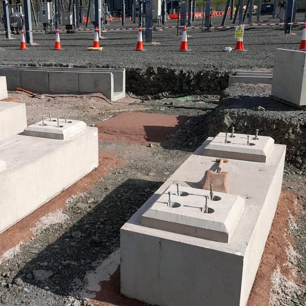 A close up of CWP's precast concrete bases, showing the connection to the steel beam